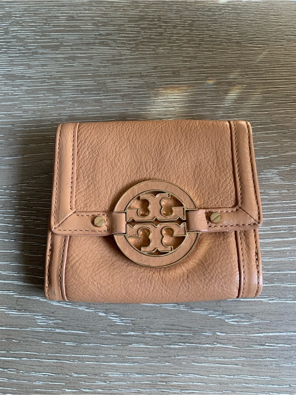 Tory Burch caramel tan leather compact wallet with logo medallion